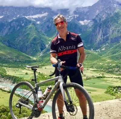 Eric Tofflemire Cycling on the  tour with redspokes